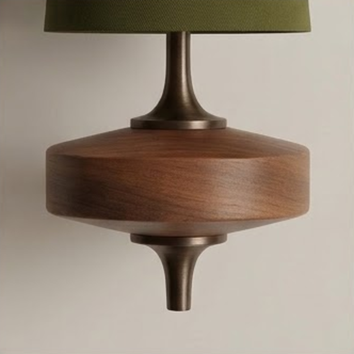 Close view of the olive shade and turned walnut mount seen from below