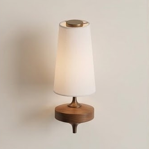 Close view of the lit white shade showing the brass top ring